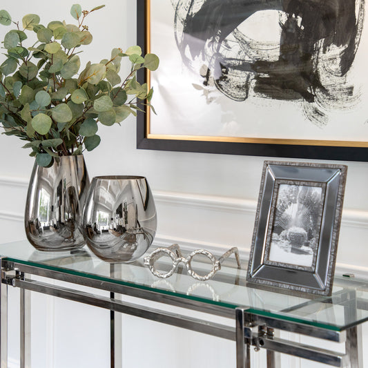 Floreros plateados tipo espejo