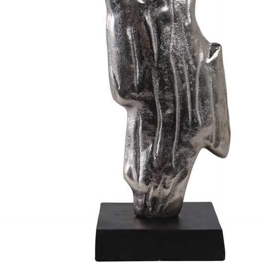 Esculturas Plateadas con negro